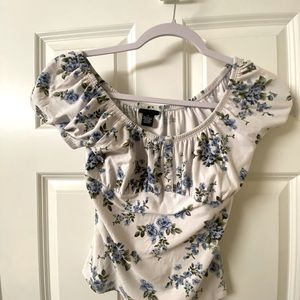 Crop top with floral design.